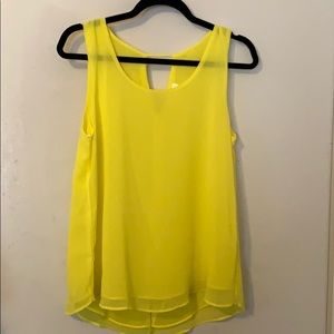 Bright yellow sleeveless blouse